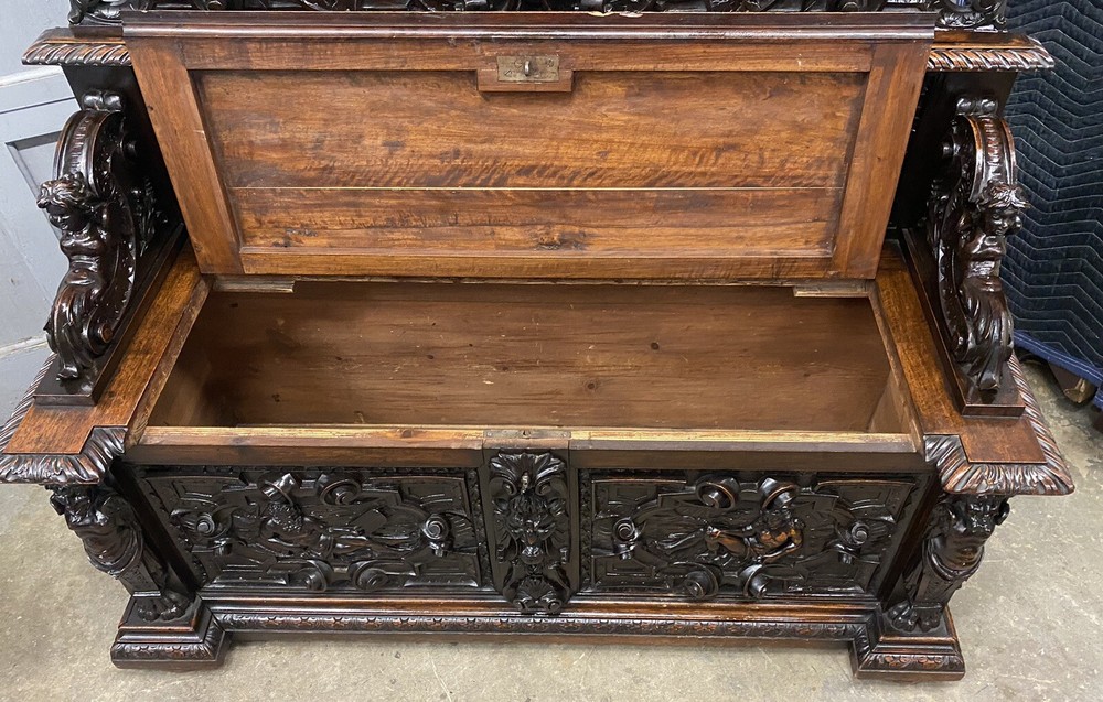CARVED FIGURAL WALNUT BENCH