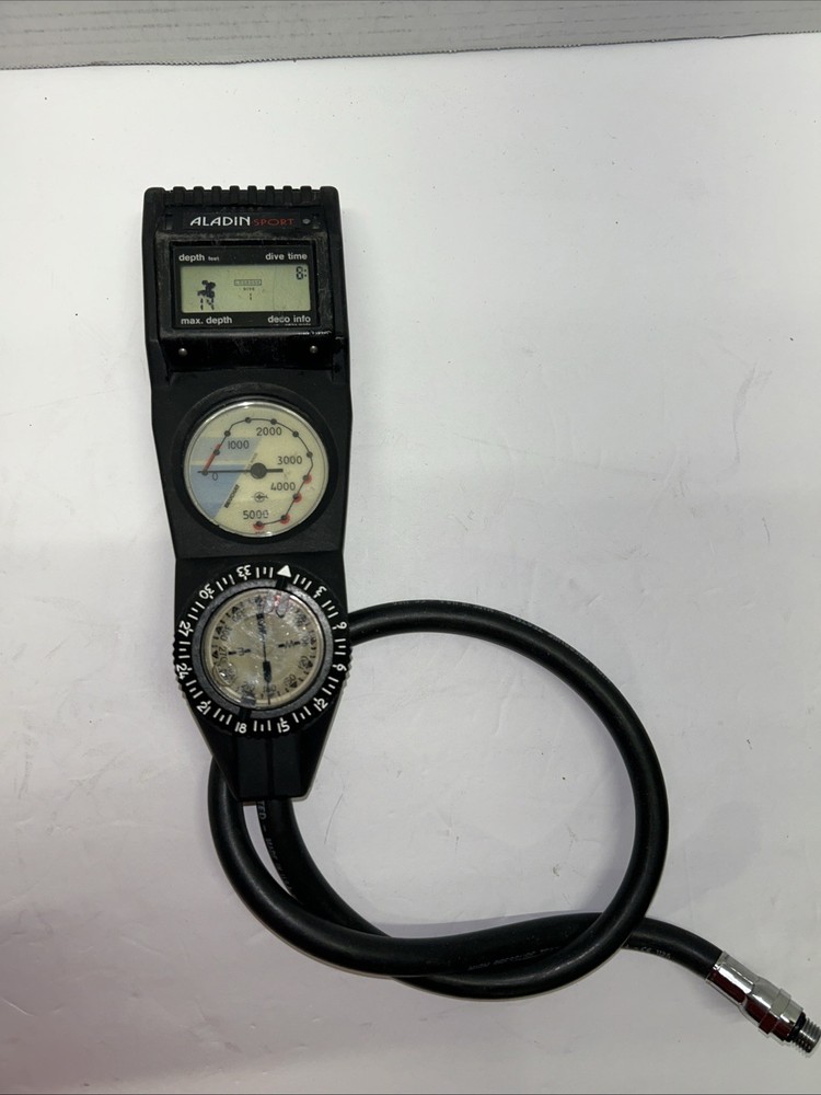 Aladin Dive Computer Console. Beuchat Pressure Gauge. Read.