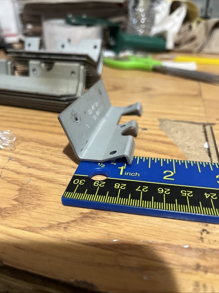 Igt coin in mounting bracket