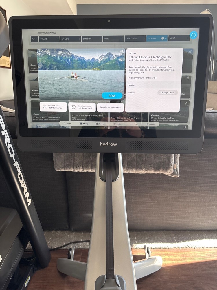 Pro Rowing Machine with Immersive 22" HD Rotating Screen - Stows Upright |