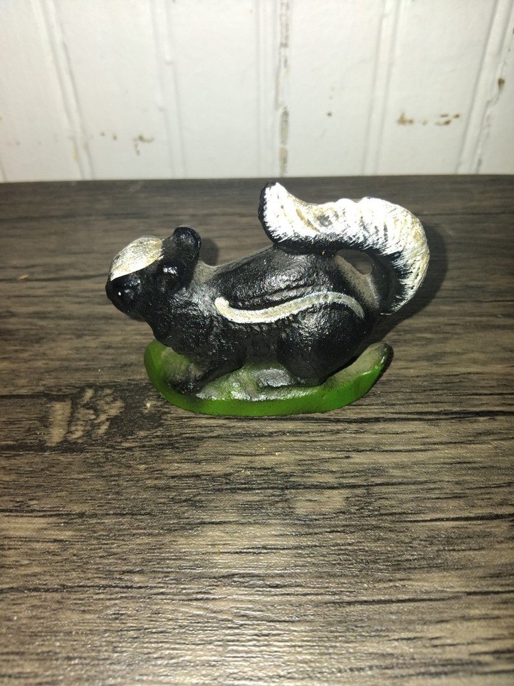 Vintage Cast Iron Painted Skunk Bottle Opener