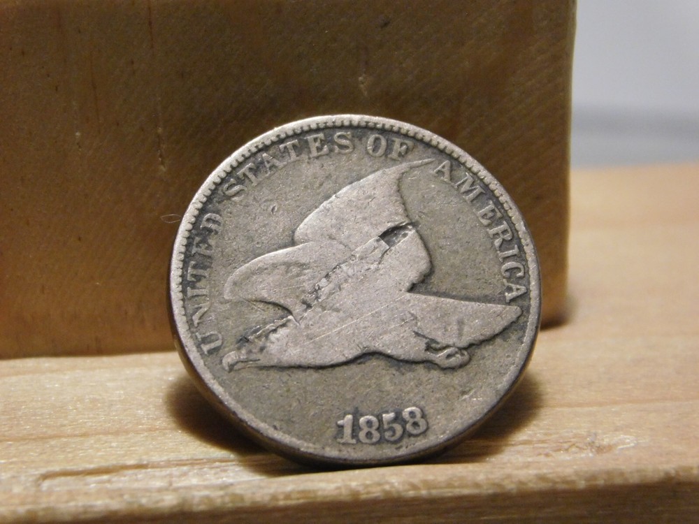 1858 Flying Eagle cent error, lamination across the center