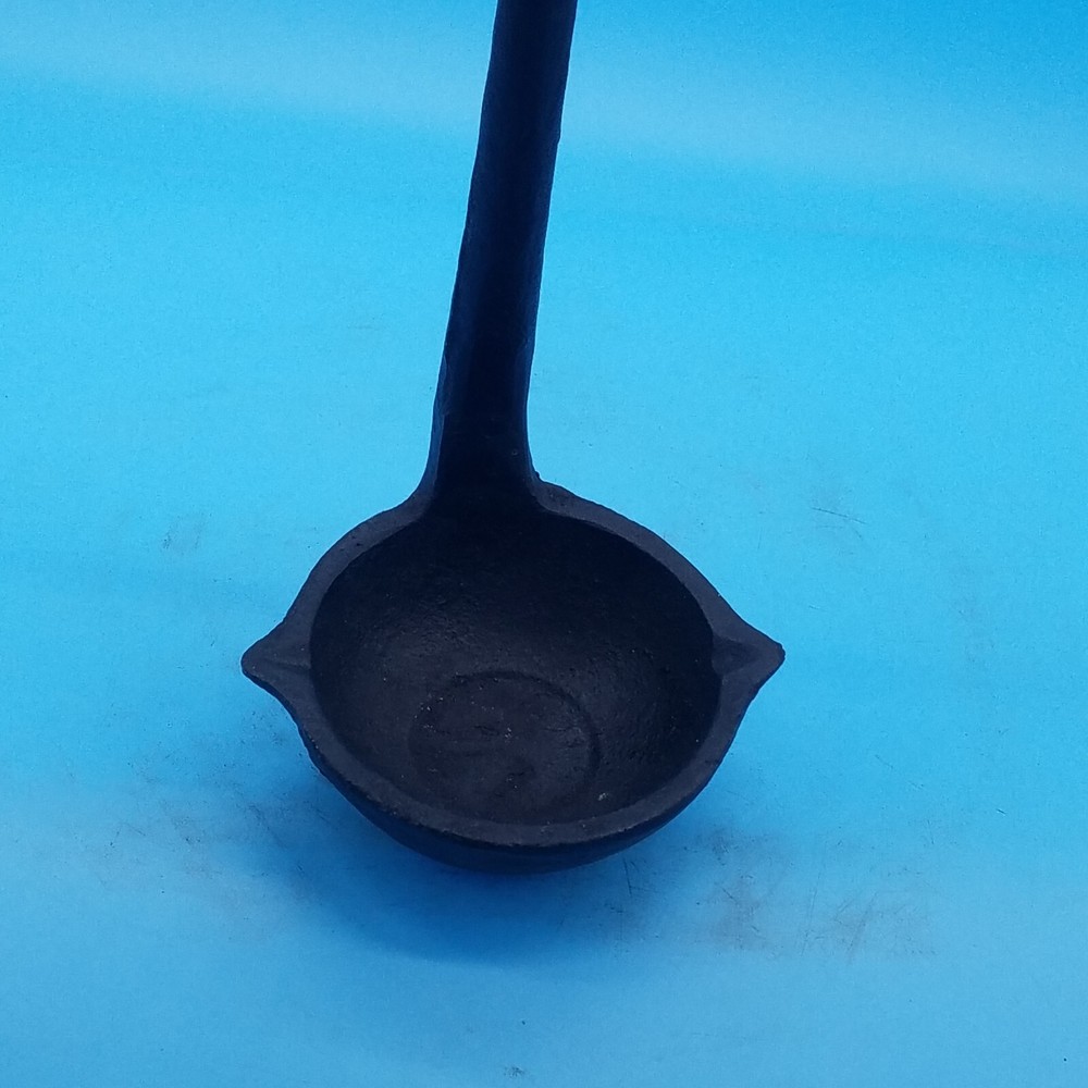 Cast iron double spout label unbranded 3"x 13 " overall