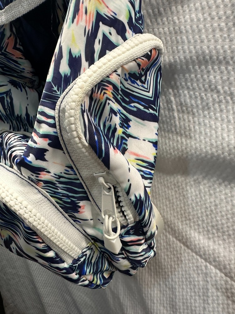 Festive Vibrant Abstract Print Backpack - Drawstring & Flap Closure Medium