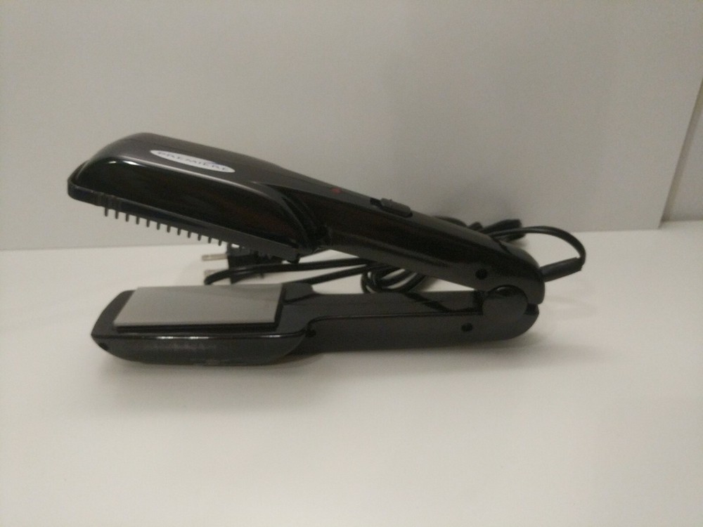 Premier Professional ceramic straighting iron. With removable guide teeth Curle
