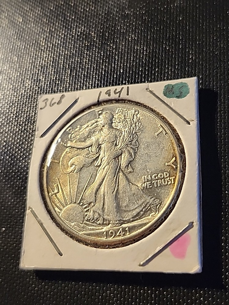 1941 Walking Liberty Half Dollar In About Uncirculated Condition