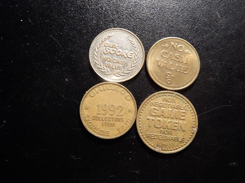 FOUR GAME TOKENS! ZZ712XQX