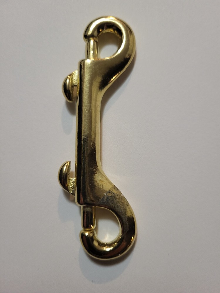 3 1/2" solid brass double sided snap hook. thumb release. leash lanyard