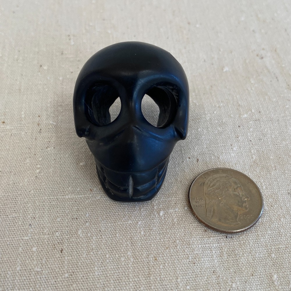 Stylized Carved Stone Skull Pendant