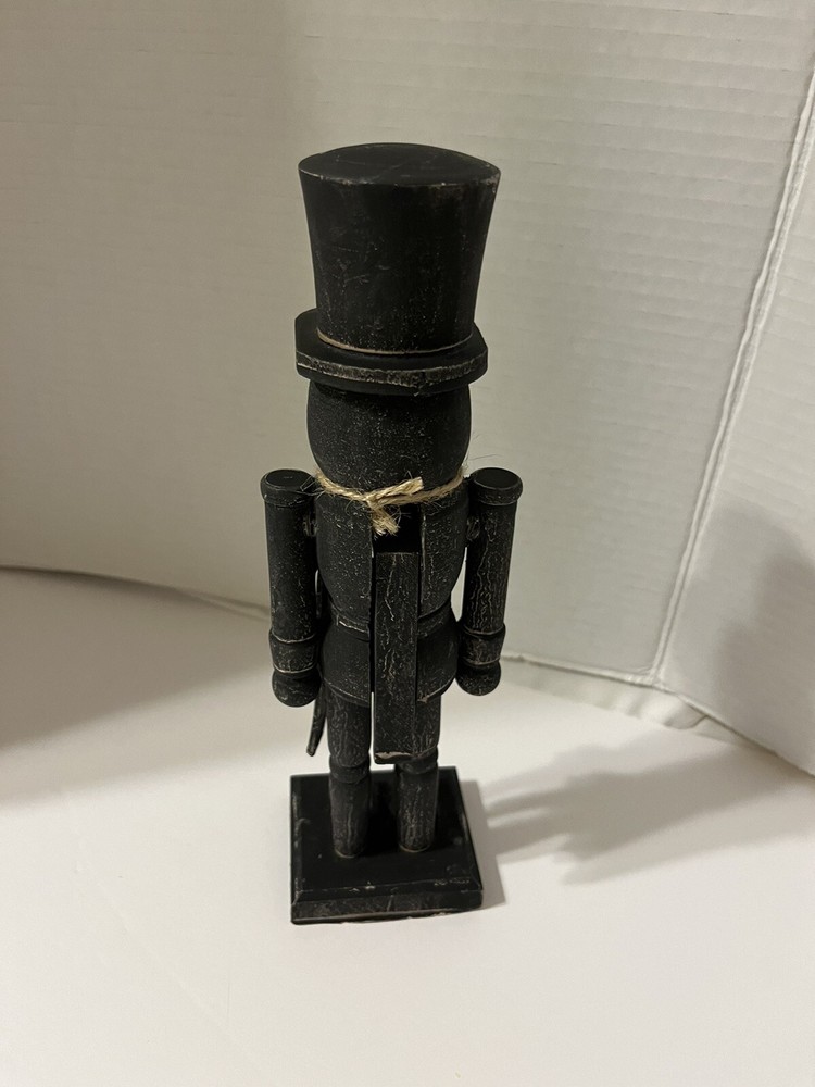 Black washed wooden folk art nutcracker