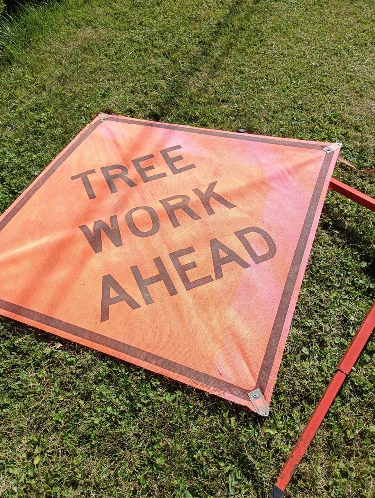bone safety tree work roll up sign the orange version condition is good