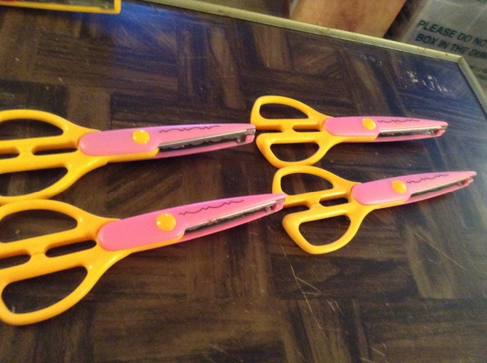 Pink and orange paper edger scissors
