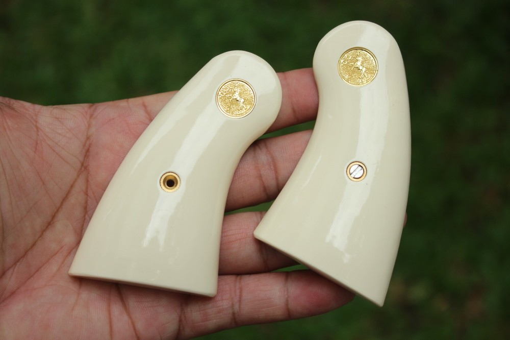 RESIN IVORY GRIPS FOR COLT PYTHON , OFFICIAL POLICE, I E FRAME # GOLD MED
