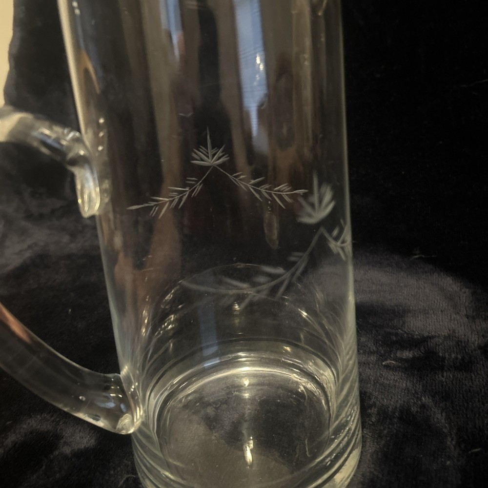 This is a vintage etched glass pitcher with a wheat pattern.