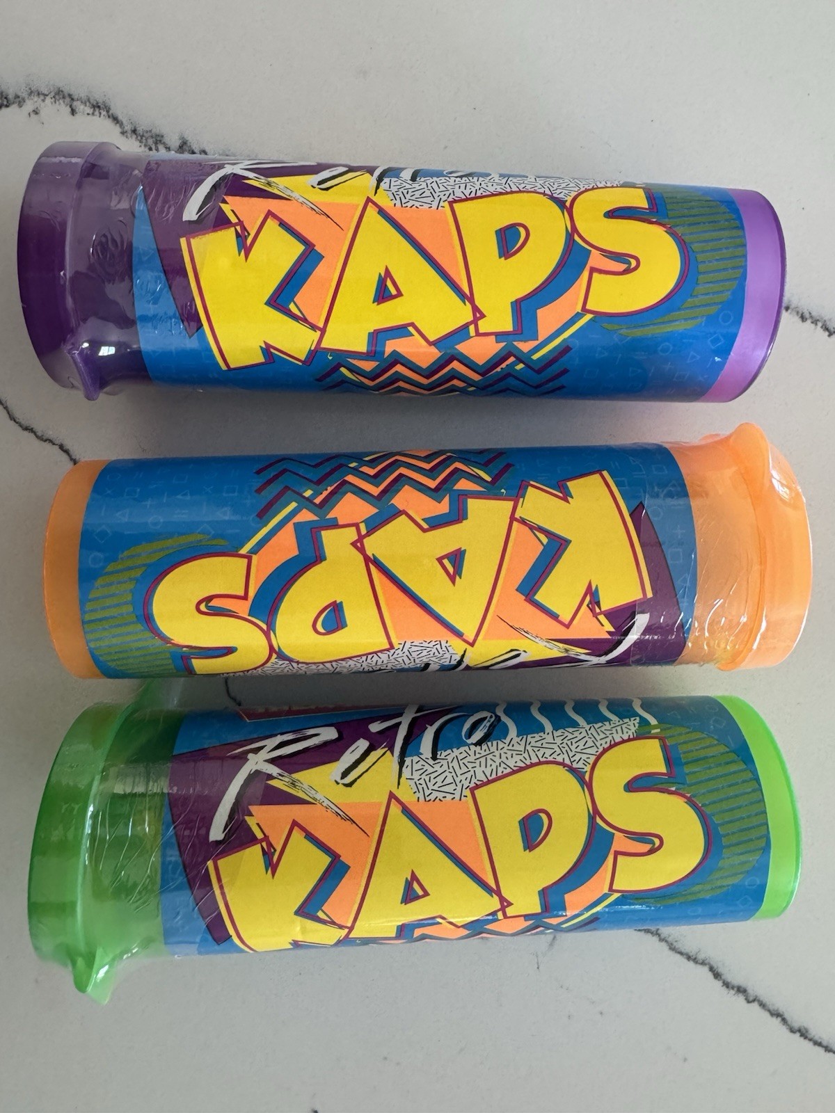 NEW- Retro Kaps Pogs (20) Metal Slammers (2) One Storage Tube! Great Kids Fun!