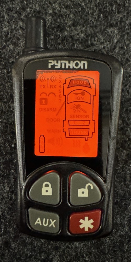 Python V/P/C EZSDEI478 Remote/USED/Case Clip Broke/Light Up/No Confirm on Trans