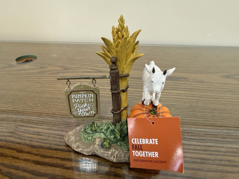 The Pumpkin Patch. Ceramic Figure Fall Season
