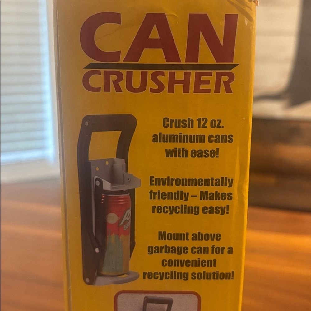 McKay Wall Mounted Can Crusher in Black includes bottle opening function