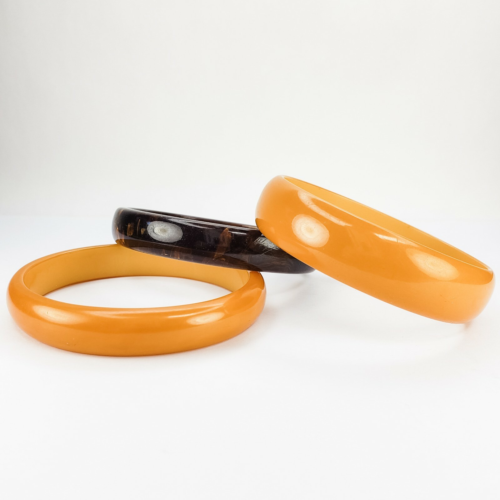Set of 3 Two Butterscotch Yellow and One Brown Swirled Bakelite Bangle Bracelets
