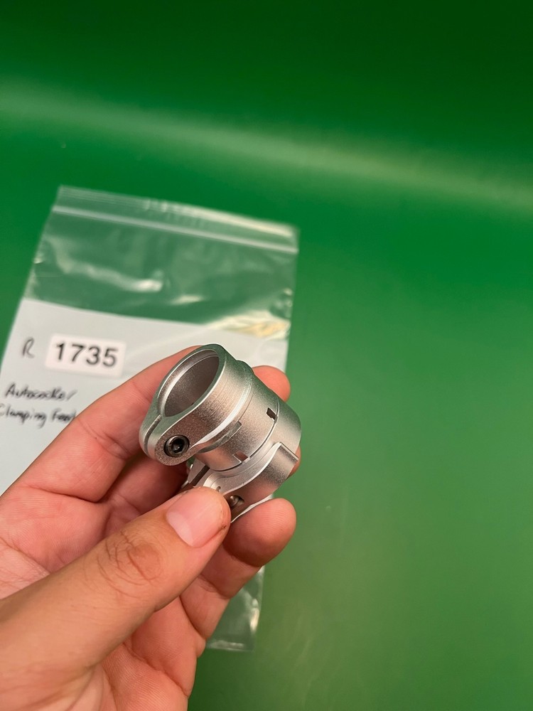 Autococker Clamping Feedneck