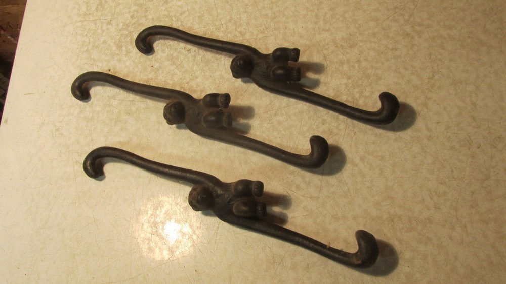 3 Antique Cast Iron Monkey Hangers Hooks