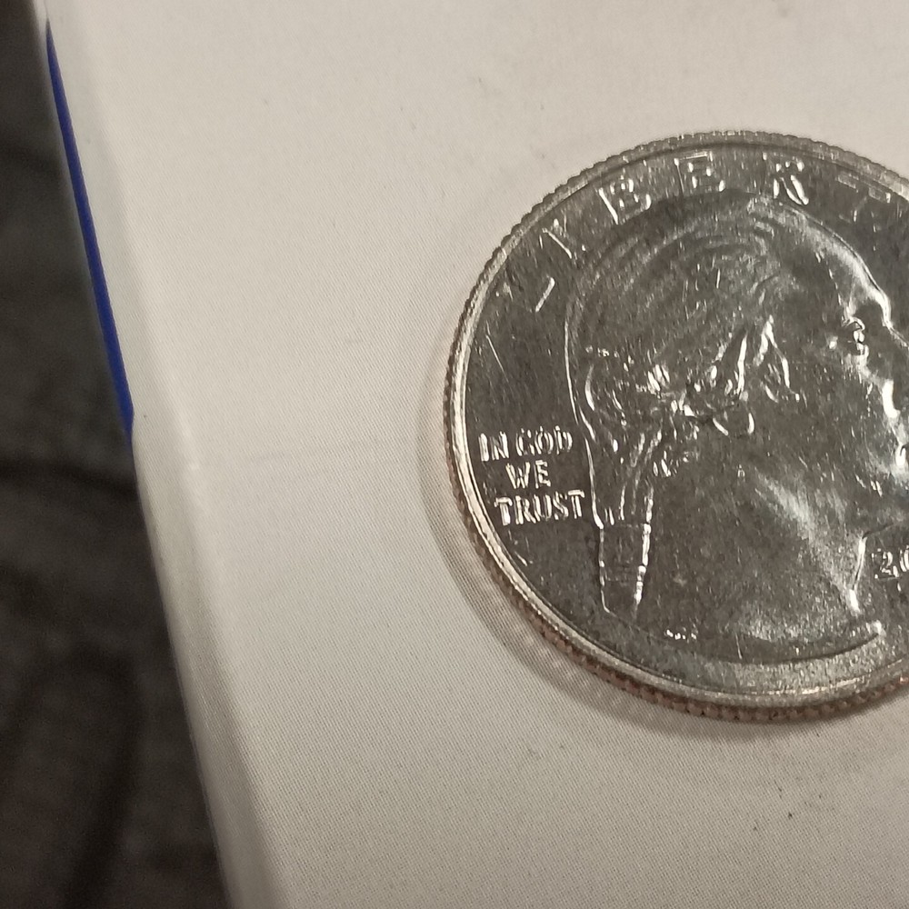 Misprint Woman's Quarter "In Cod We Trust"