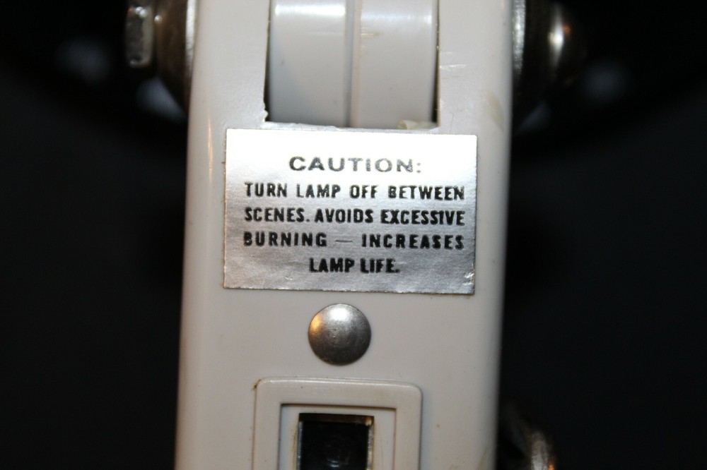 VINTAGE ACME-LITE MOV-E-LITE! TESTED AND WORKS NICE GRAPHICS ON CASE!