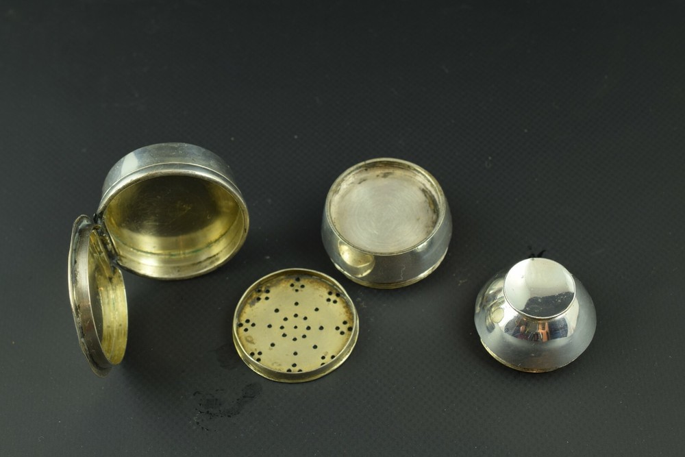 Three-part silver salt shaker or cellar. XIX century.