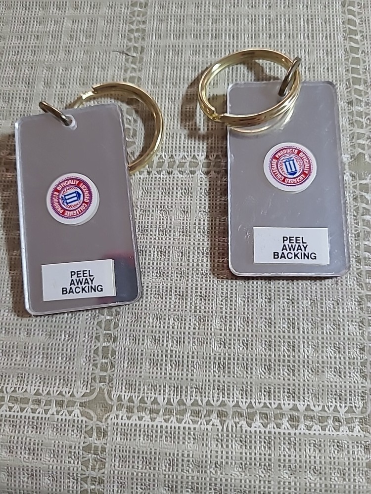 TWO TIGER KEY CHAINS WITH MIRROR ON THE BACK