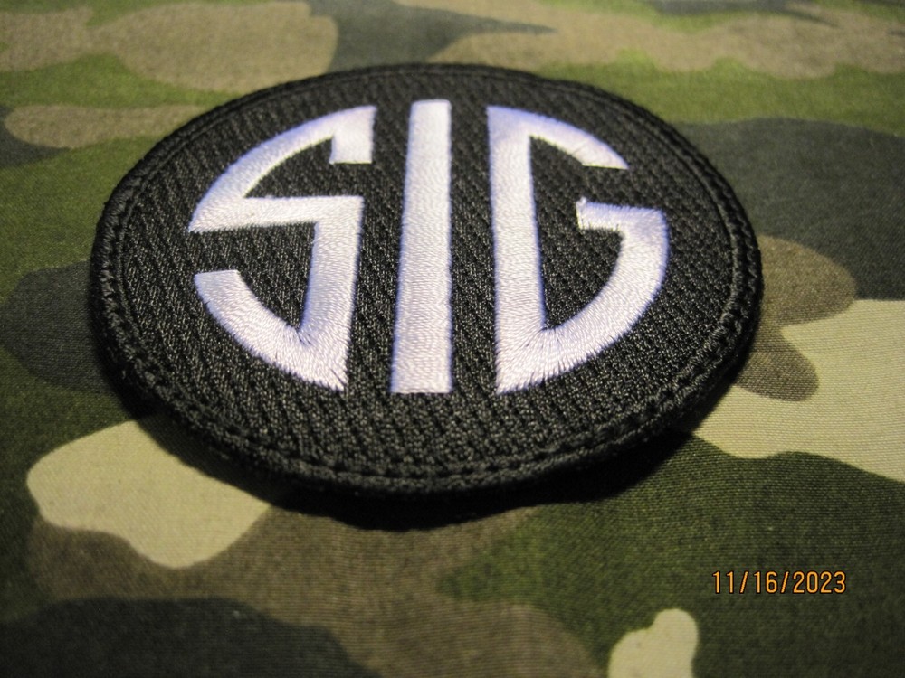SIG SAUER HOOK BACK PATCH SIG CIRCLE BLACK USED GOOD CONDITION