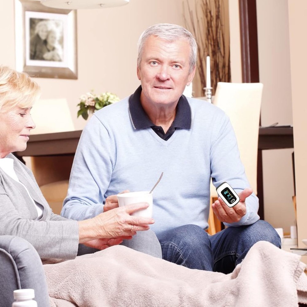 Portable Finger Pulse Oximeter with OLED Display - Includes 2 AAA Batteries