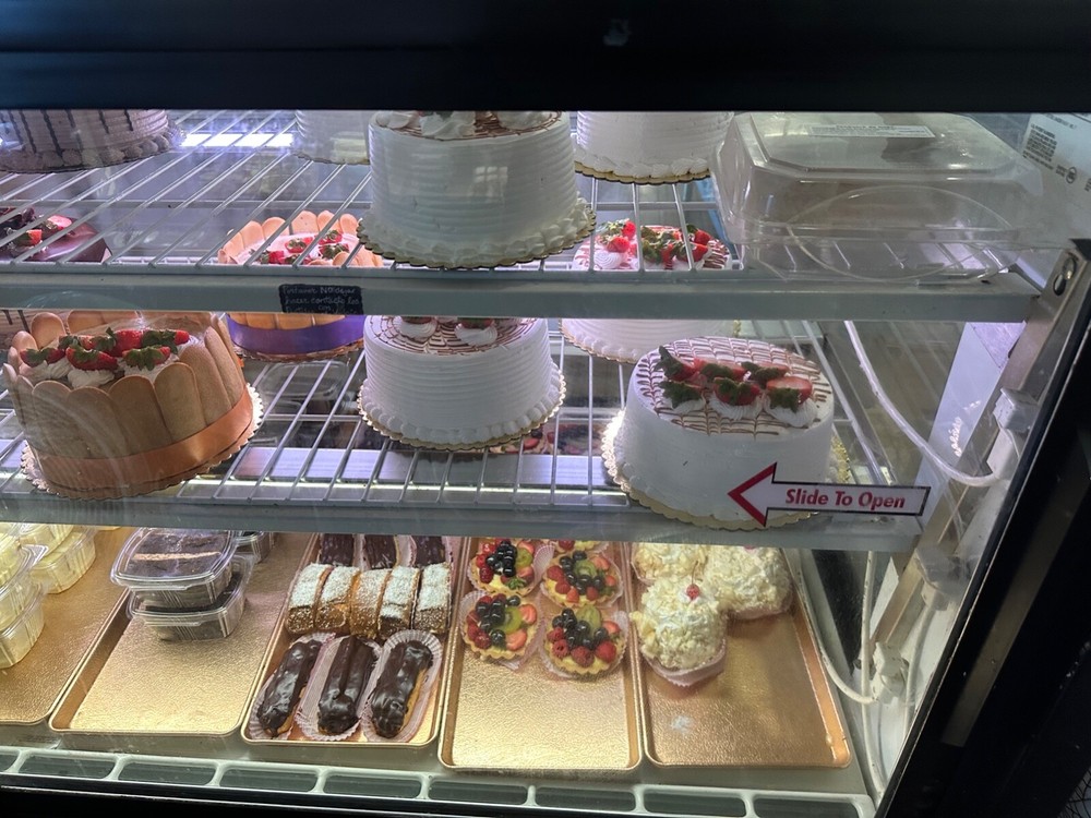 true curved glass display merchandiser