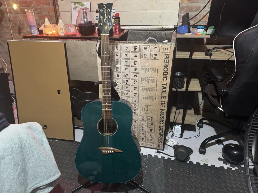Blue-teal Playmate Guitar