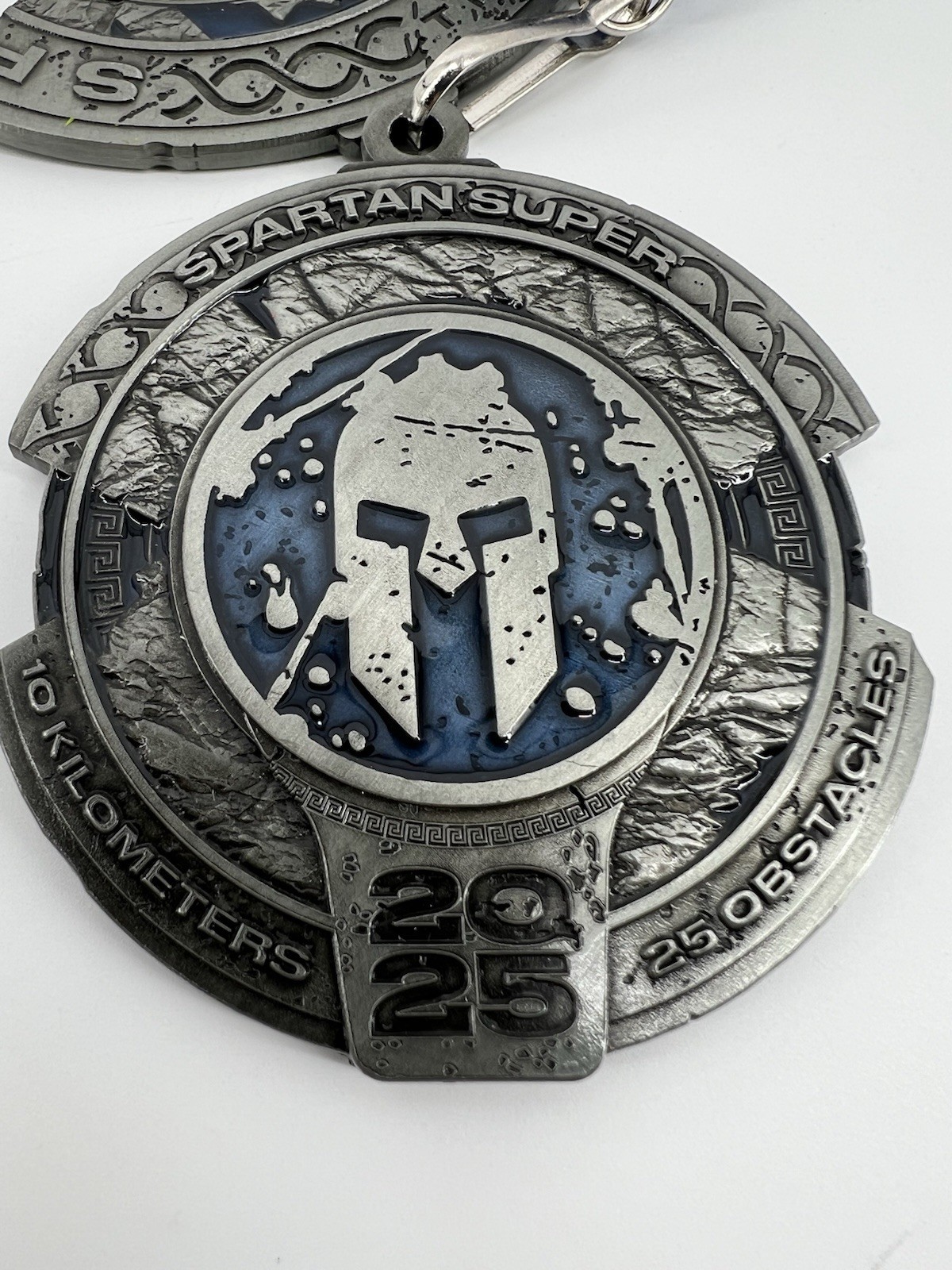 Spartan Super 2025 Finisher Medal Silver Blue 10 Kilometers 25 Obstacles