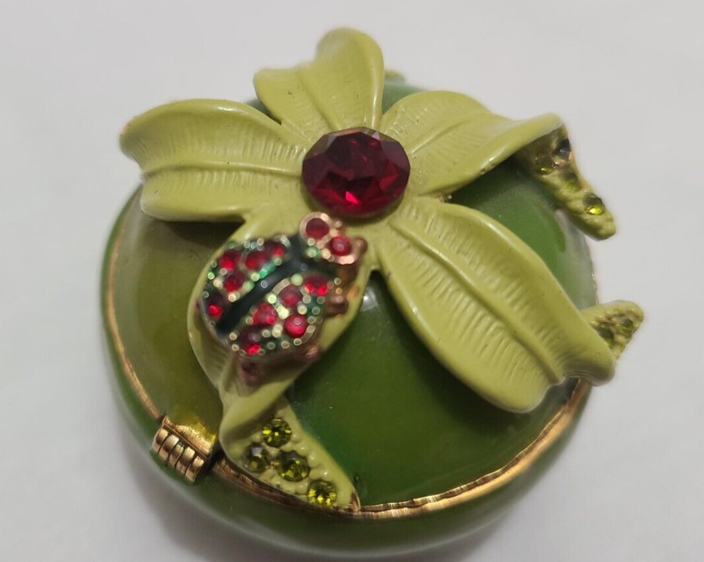 Orrefors pills box with flower and ladybug