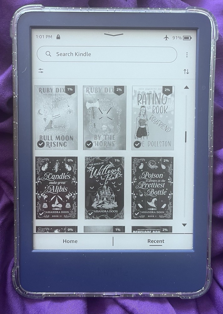 Amazon Kindle ereader Blue with books