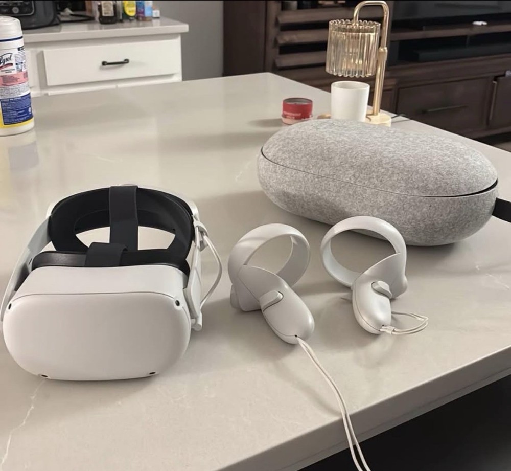 Meta quest 2 with official headset strap and case comes with controllers