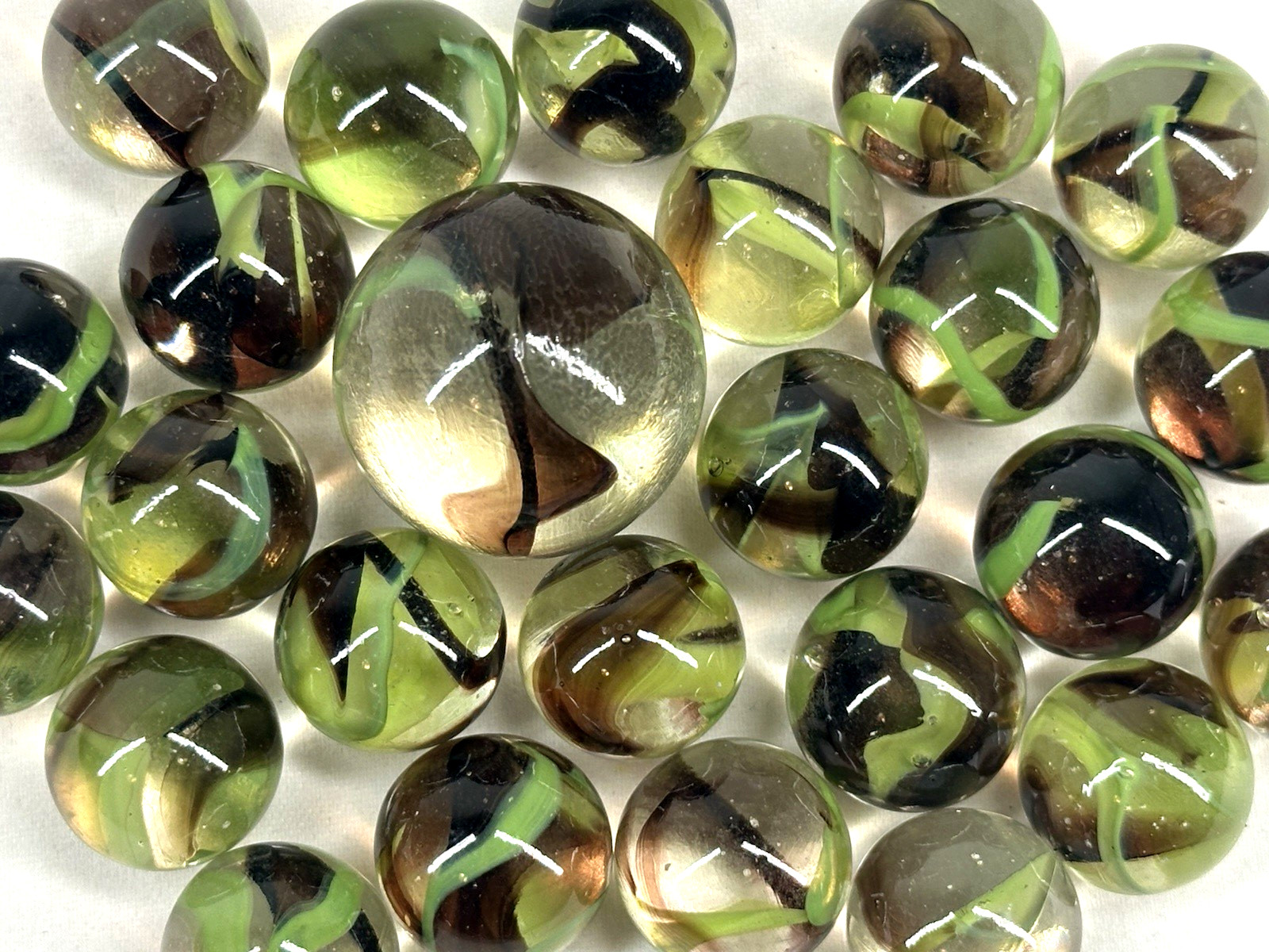 25 Glass Marbles BIGFOOT Clear/Green/Brown Shooter game Pack Swirl