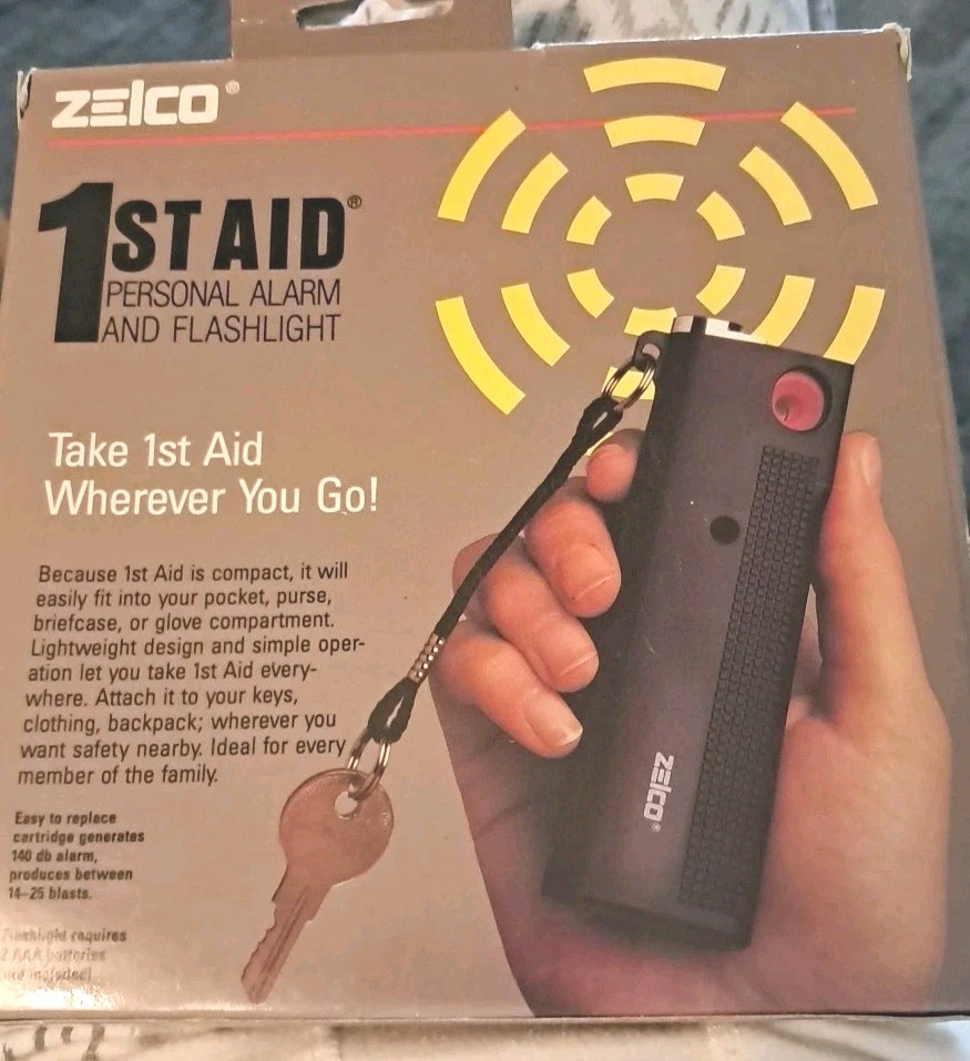 Zelco 1ST AID PERSONAL ALARM / FLASHLIGHT