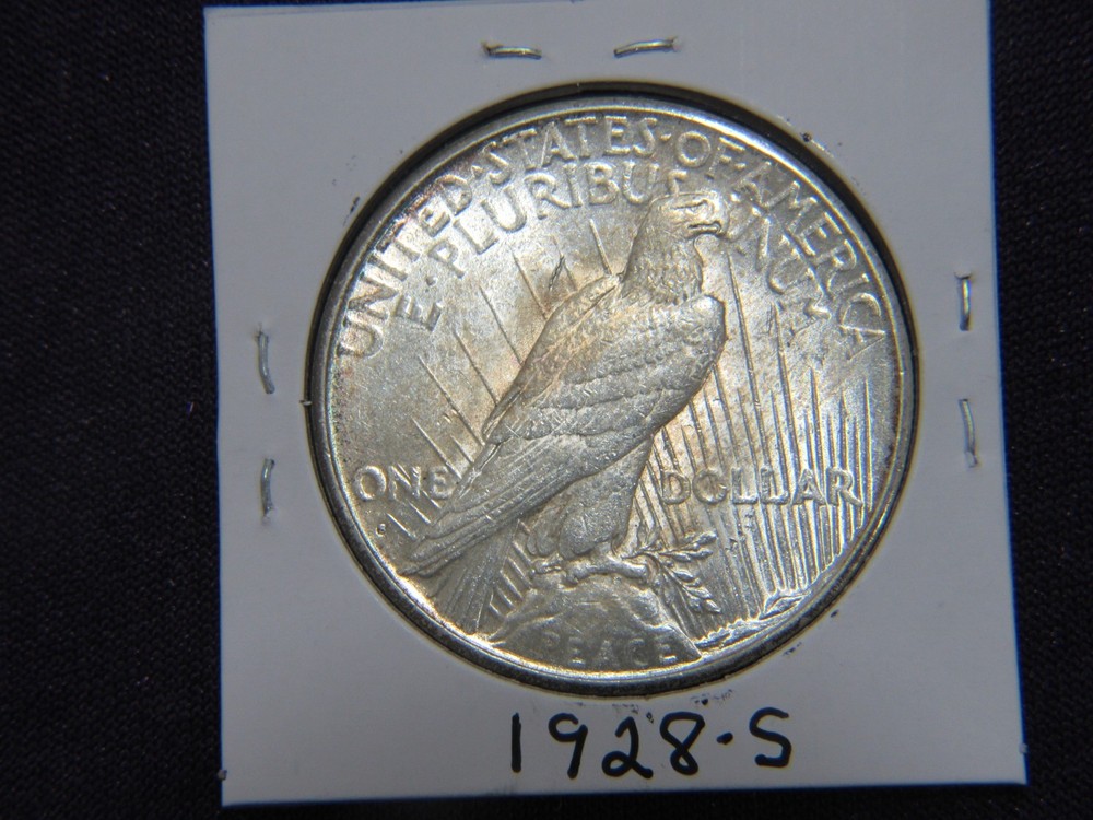 1928-S Peace dollar in A.U. / UNC condition