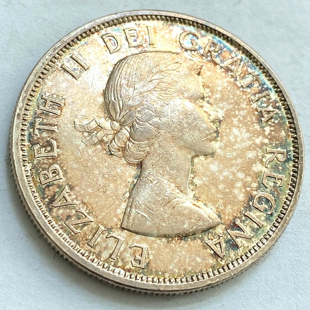 1962 Canada Dollar Gem Unc. Beautiful Pastel Toning CHN