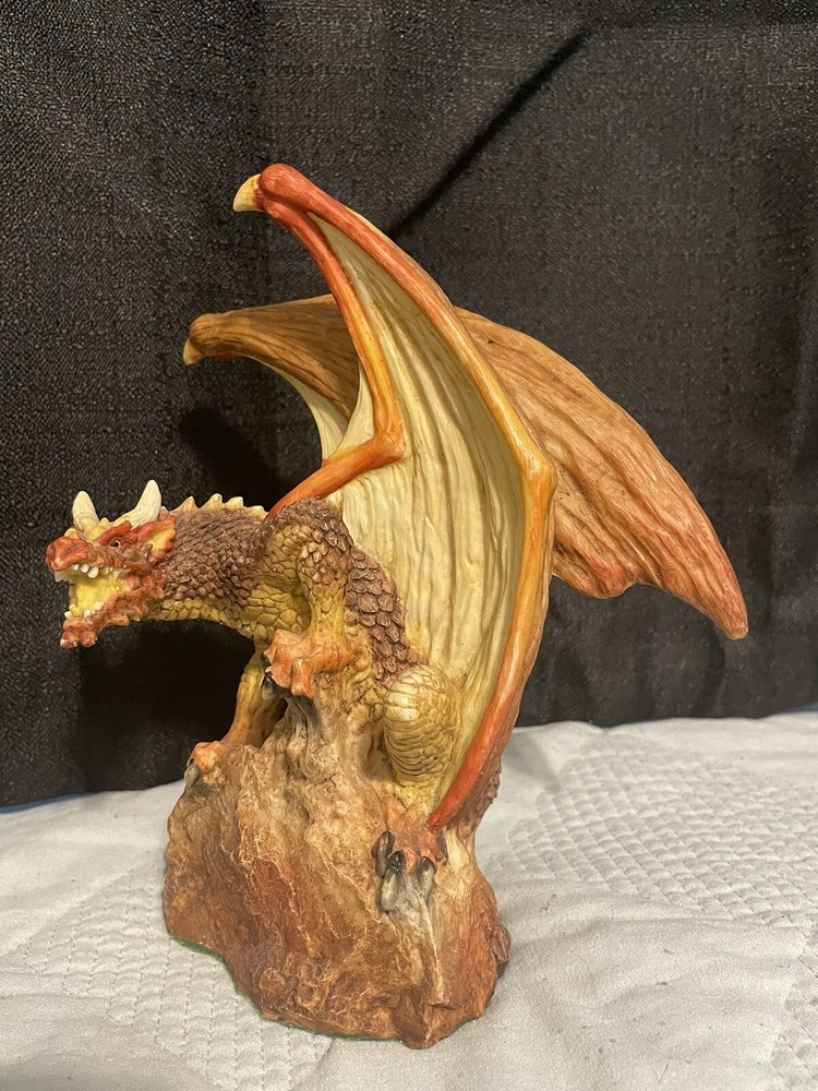 signed dragon figure