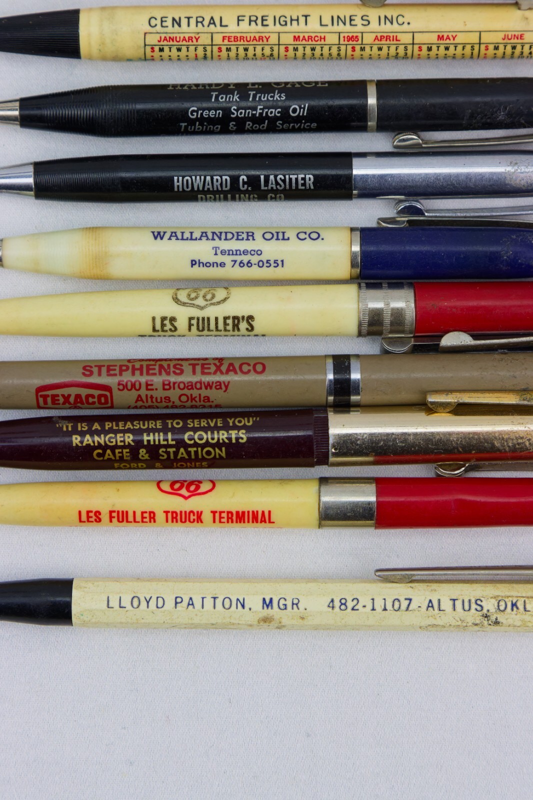 Oil, Trucking and Land Advert Items; Wood Box, Pencil Sharpener and Pens/Pencils