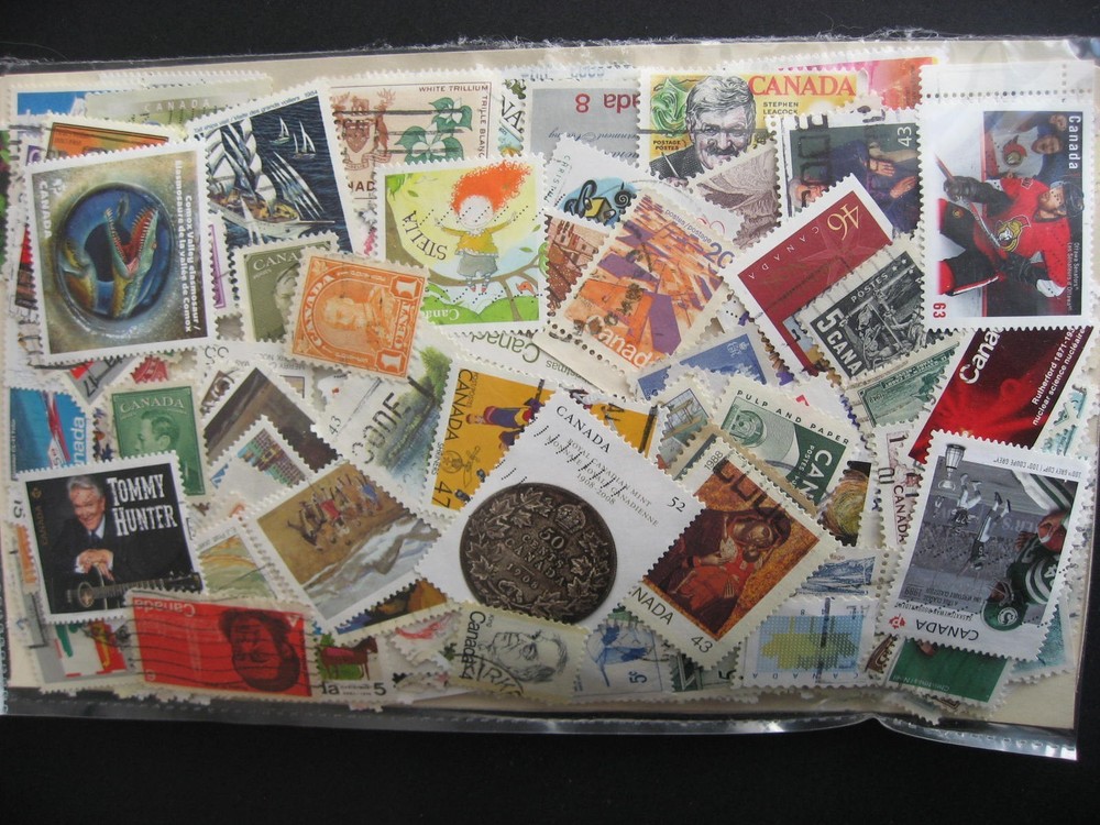 Canada colossal mixture (duplicates, mixed cond) 10000 35% comems, 65% defins