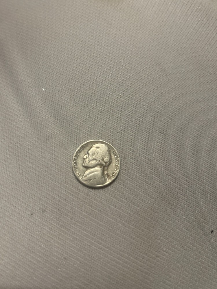 1941 Nickel No mint mark with rim error.