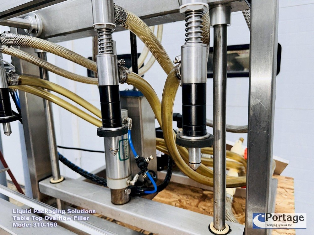 Liquid Packaging Solutions Model: 310-150 || Semi-Automatic Table Top Overflow