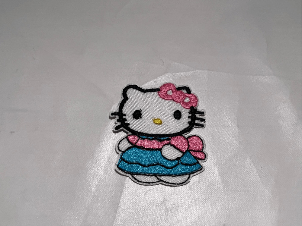 Hello Kitty with a Dress On Iron on Patch