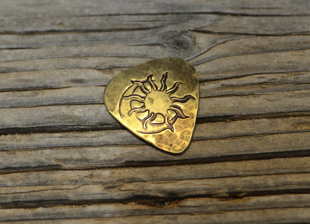 Sun and Moon playable brass guitar pick