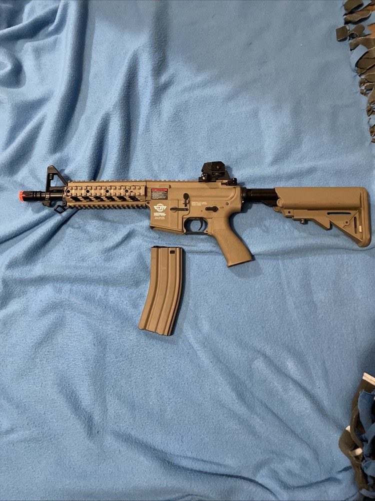 A. E. G. Combat Machine Airsoft Gun (w/ Mid Cap Magazine)