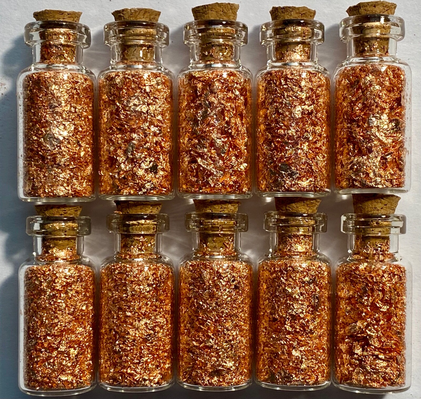 10 Bottles of Real Large Copper Flakes ..... Lowest price on the Net